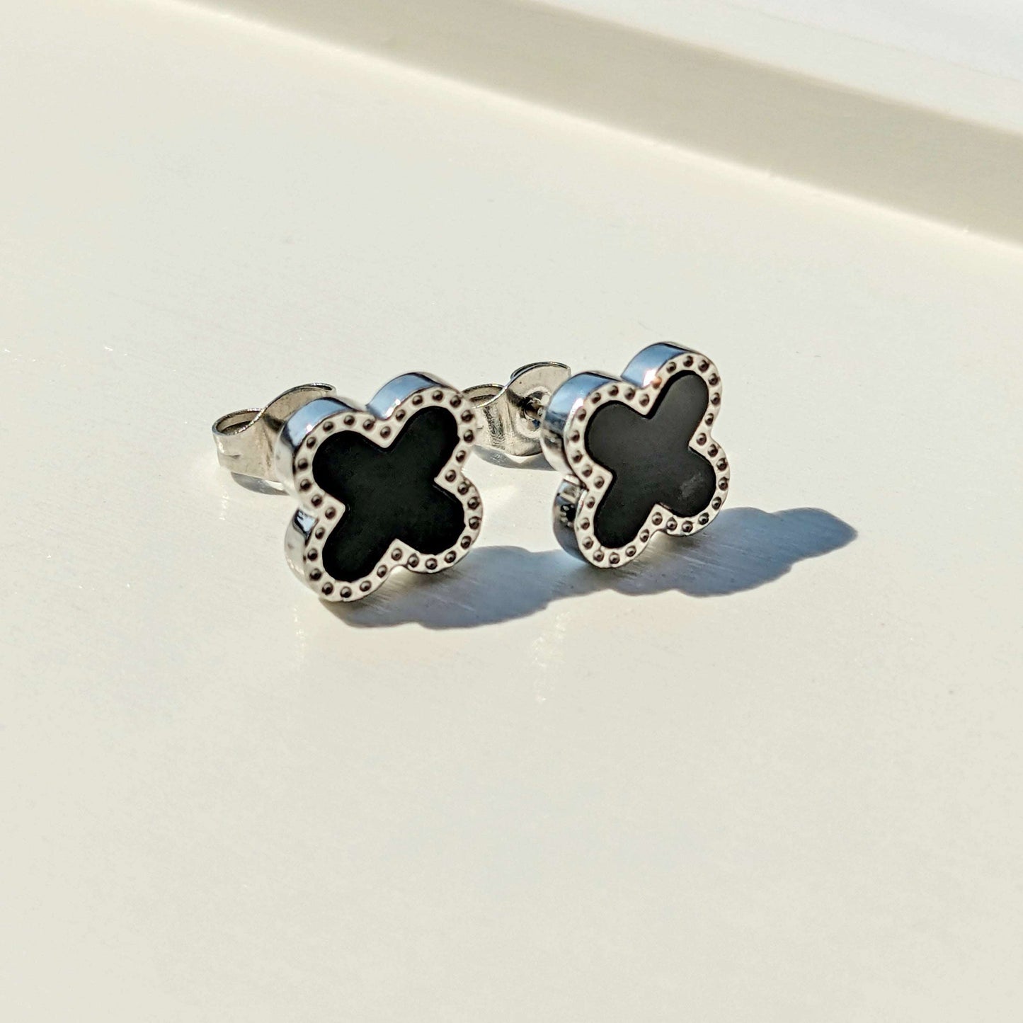 Black clove studs