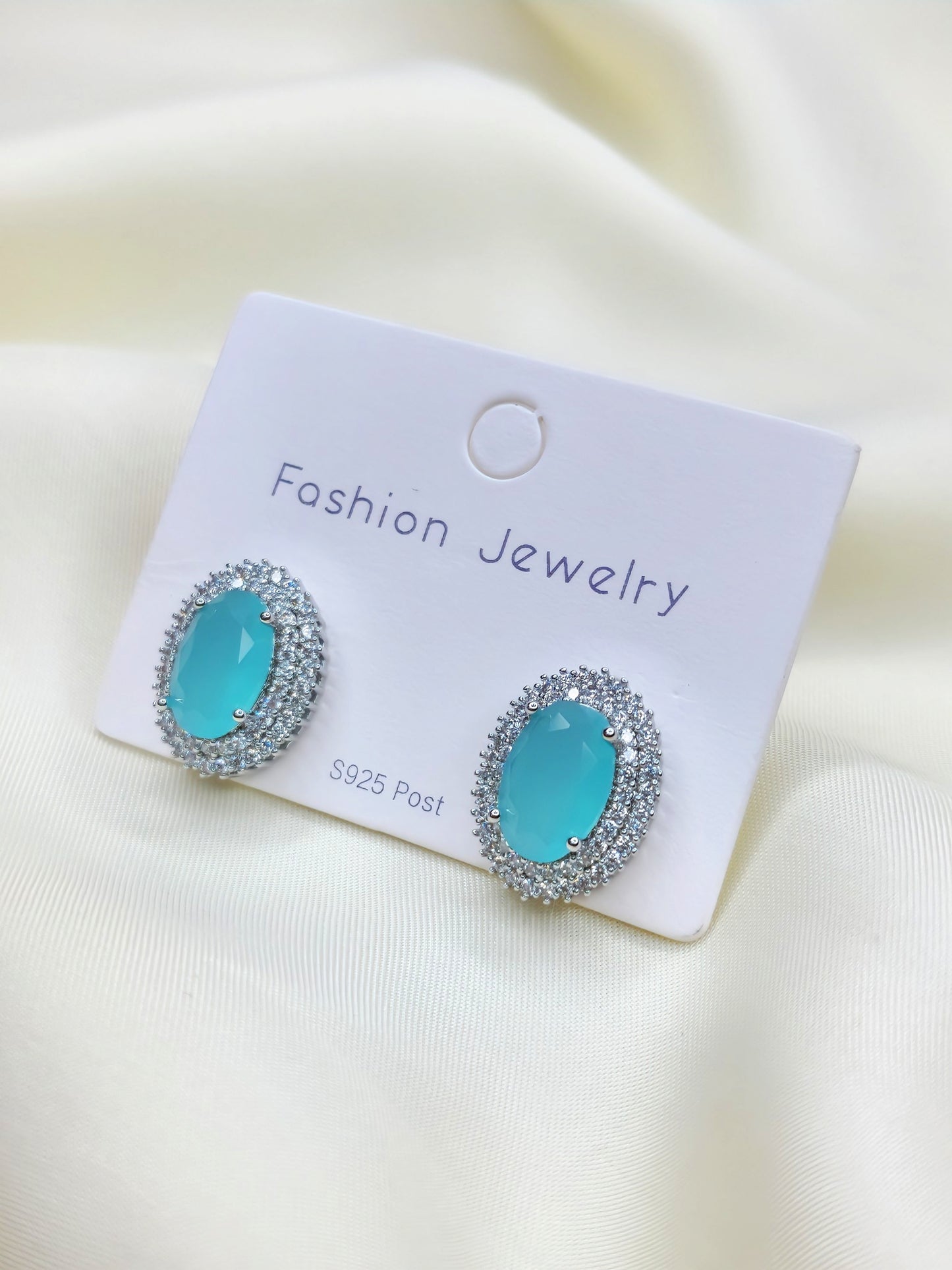 Pastel Blue Oval Halo Studs